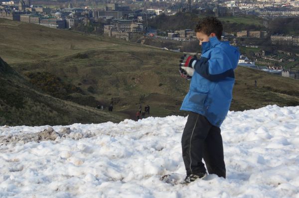 Making a big snowball.