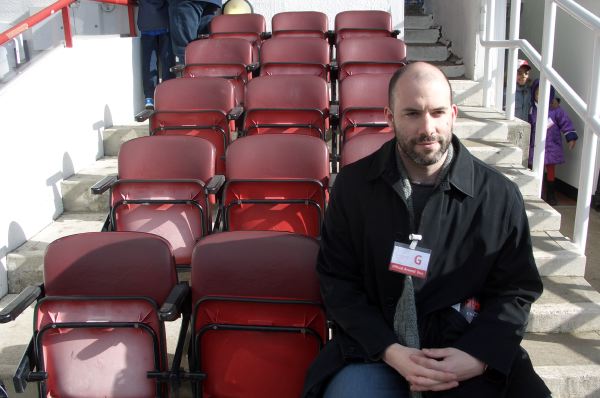 Sitting in Arsène's seat.